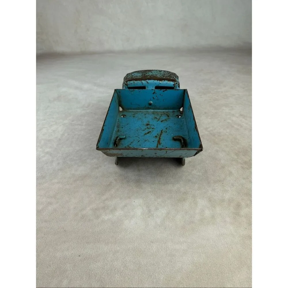 Vintage 6in Blue Wyandotte Pressed Steel Dump Truck Toy READ